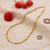 1 Gram Gold Forming Superior Quality Gorgeous Design Gold Plated Chain - gold necklace and earrings on table