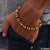Gold plated bracelet for men with black and white beads