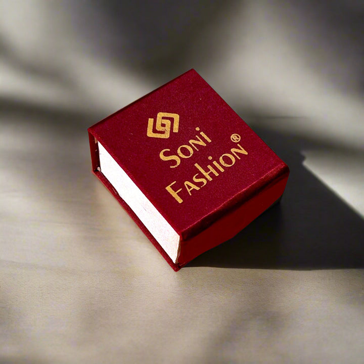 Red box with 'Soni Fashion' branding on a white shelf

