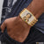Gold plated Bal Krishna bracelet for men with diamond and emerald design