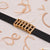 Black belt with gold buckle and rhinestones for Diamond Gold Plated Rubber Bracelet