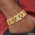Gents gold plated c into exciting design om bracelet