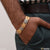 Man wearing gold bracelet featuring Jaguar Exceptional Design - Style B598