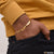 Man wearing gold bracelet from Kada Cool Design Superior Quality Gold Plated Punjabi Kada for Men - Style B081