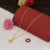 Fashion-forward Gold Plated Necklace with Small Flower Design