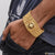 Stylish man wearing premium grade quality gold plated bracelet with lion face design.