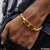 Gold plated men’s bracelet with red stone, fixed lock, style B082