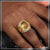 Yellow sapphire and diamond ring on a woman’s hand from Om Yellow Stone collection