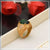 Owal shape green stone with diamond glittering design gold