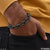 Man wearing black color bracelet with chain - Ring Into Ring Fancy Design B555