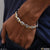 Man wearing stainless steel hip hop bracelet with gold and silver links - Style B172