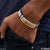 Man wearing a gold and silver bracelet from Silver And Golden Unique Design Premium-grade Quality Gold Plated Bracelet For Men - Style B155