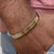 Man wearing gold plated bracelet with silver color kada design from Style A903