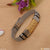 Silver color bracelet with metal clasp and flower detail - Zig-Zag Design B165
